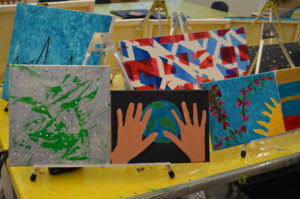 5A children's artwork displayed on a table