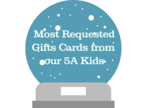 A snowglobe with the words that read most requested gift cards from 5A Kids