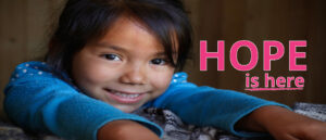 HOPE IS HERE Campaign cover with a little girl smiling