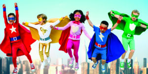 Superhero kids flying in capes