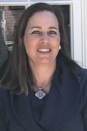 Woman with long hair and necklace