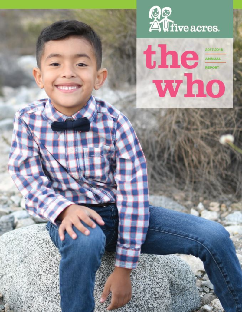 Child in plaid shirt outdoors