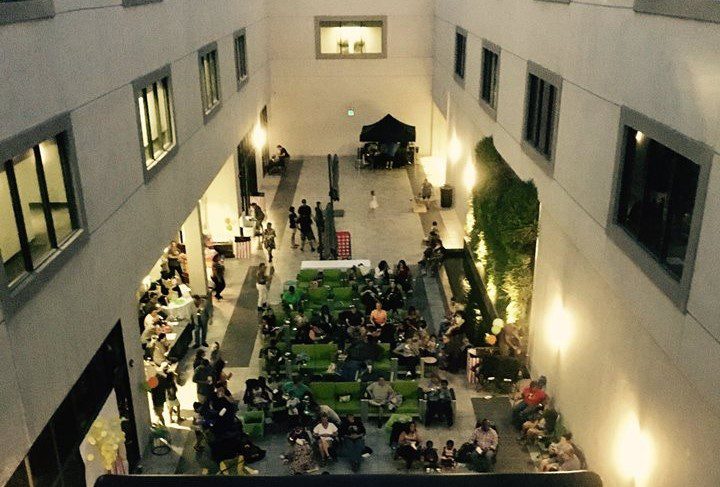 Evening event in urban courtyard